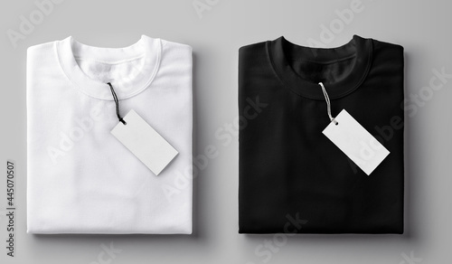 Black and white folded t-shirt with label.