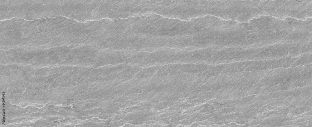 Gray grunge banner. Abstract stone background. The texture of the stone wall. Close-up. Light gray rock backdrop Gray grunge banner. Abstract stone background. The texture of the stone wall. Close-up. Light gray rock backdrop
