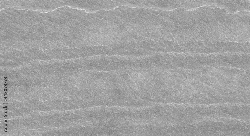 Fototapeta premium Abstract stone background. The texture of the stone wall. Close-up. Light gray rock backdrop