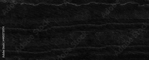 Panorama black lined marble stone background with copy space. Black grunge banner with rock texture