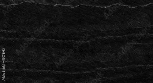 Black lined marble stone background with copy space. Black grunge banner with rock texture