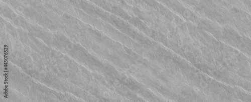 Panorama gray grunge banner. Abstract stone background. The texture of the stone wall. Close-up. Light gray rock backdrop