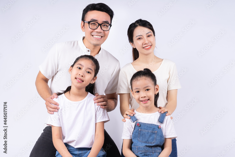 Portrait of Asian family on white background Portrait of Asian family on white background