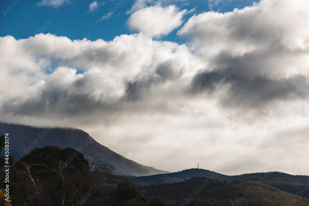 thick clouds over the hills and mountains of Tasmania, Australia