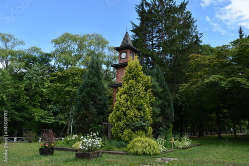 The beautiful clock tower of the Tsukisamu green park with a clear blue sky in Sapporo Japan photo