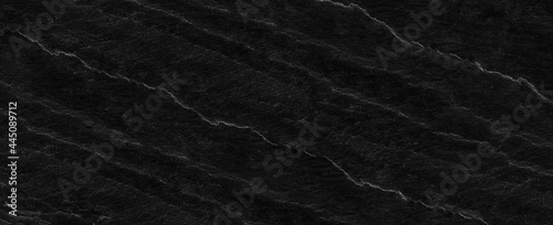 Panorama black rock background. Dark gray stone texture. Black grunge background.