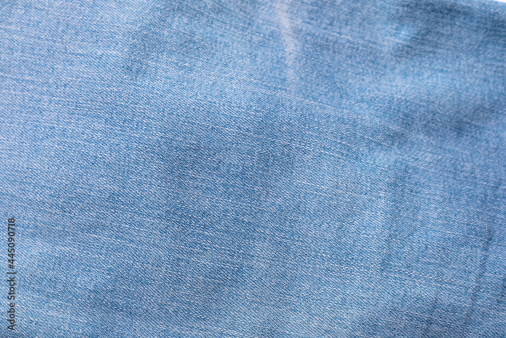Old Blue jeans fabric denim texture background for design. Canvas denim. Close up view. Old Blue jeans fabric denim texture background for design. Canvas denim. Close up view.