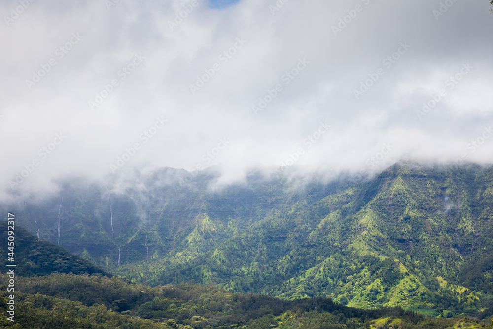 Green hills, waterfalls and mist at Halelea Forest Reserve, Kauai, Hawaii