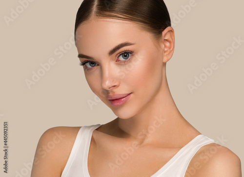 Beautiful woman face healthy clean skin close up beauty young model
