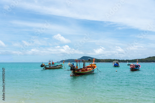 beautiful sea summer with boat at Phuket province  Thailand. subject is blurred and noise.