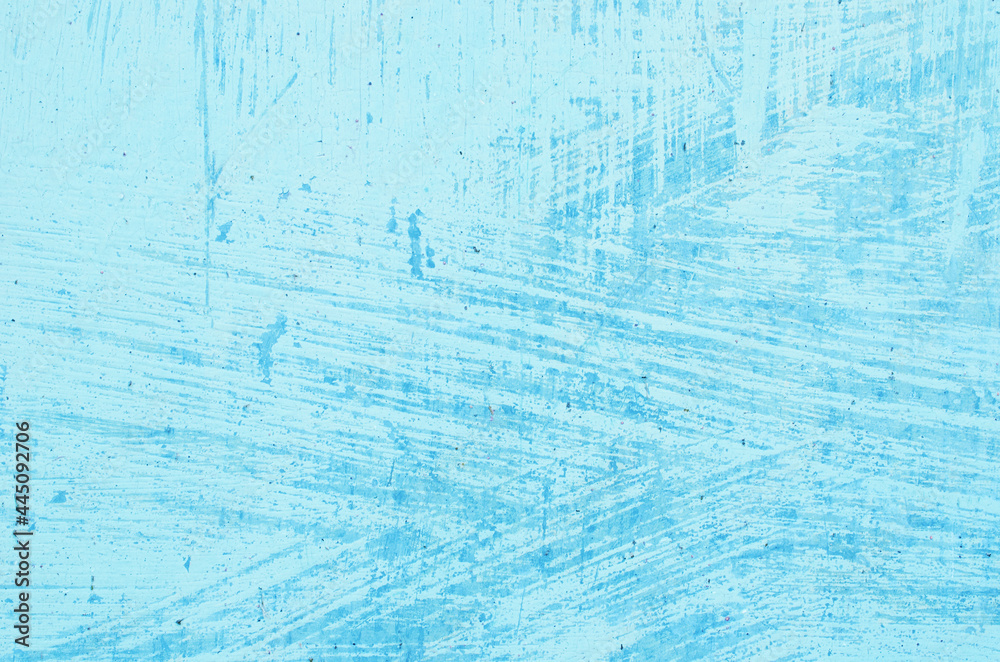 The metal background is painted in a pale blue color with brush marks The metal background is painted in a pale blue color with brush marks