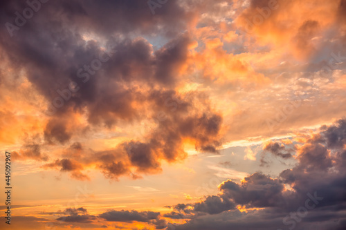 Fototapeta Naklejka Na Ścianę i Meble -  Sunset dramatic sky clouds with sunbeam