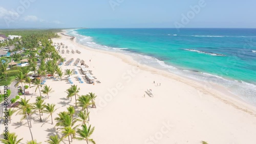 Drone view along waterfront Punta Cana Hard Rock resort and sandy beach, Dominican Republic. Aerial photo