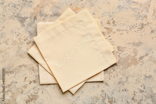 Fabric napkins on grunge background