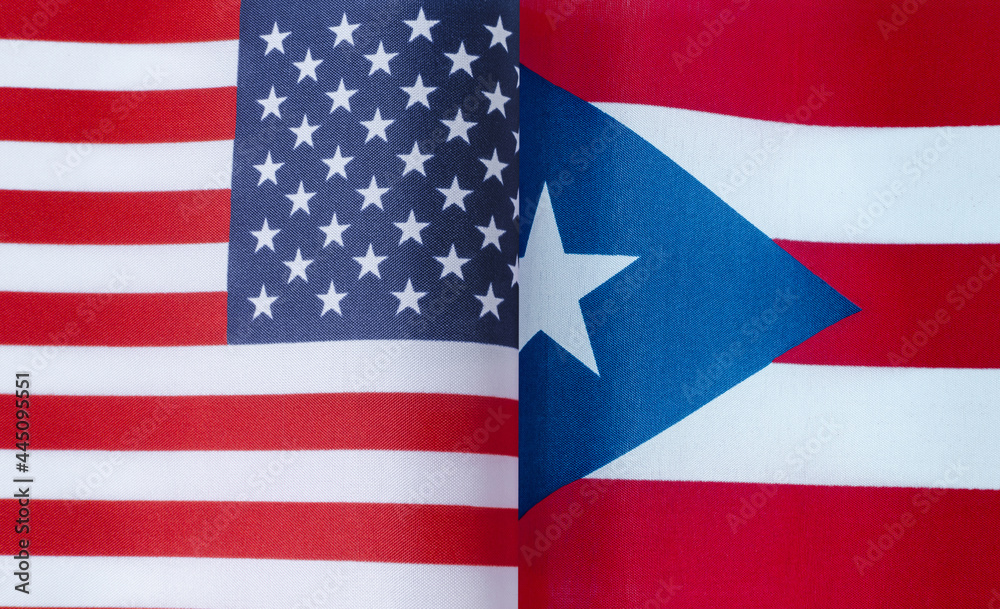 Obraz premium fragments of the national flags of the United States and Puerto Rico close-up