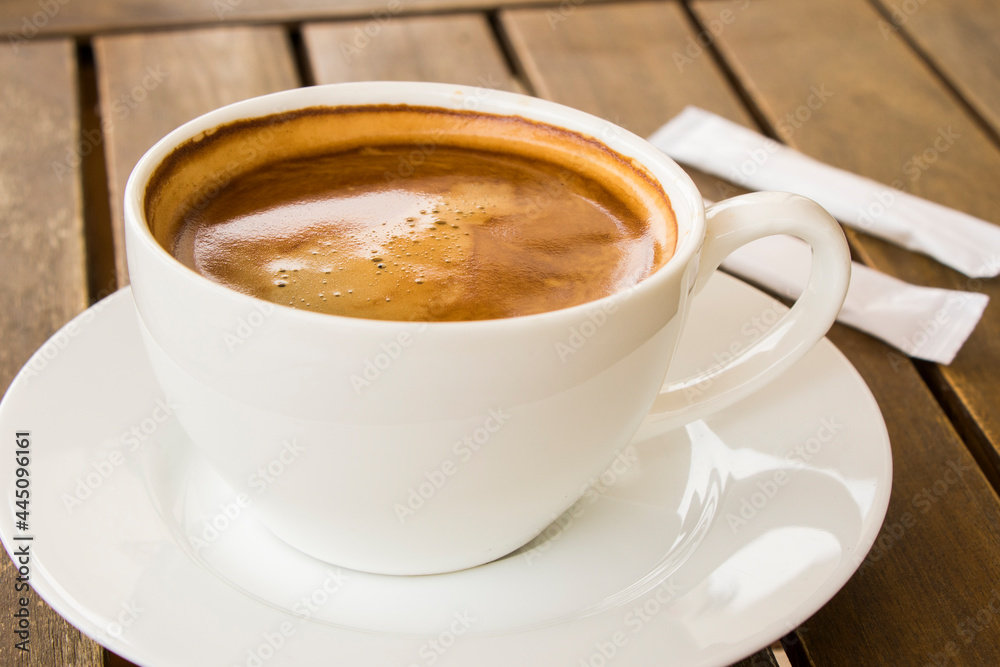 Coffee Americano in the white cup Coffee Americano in the white cup