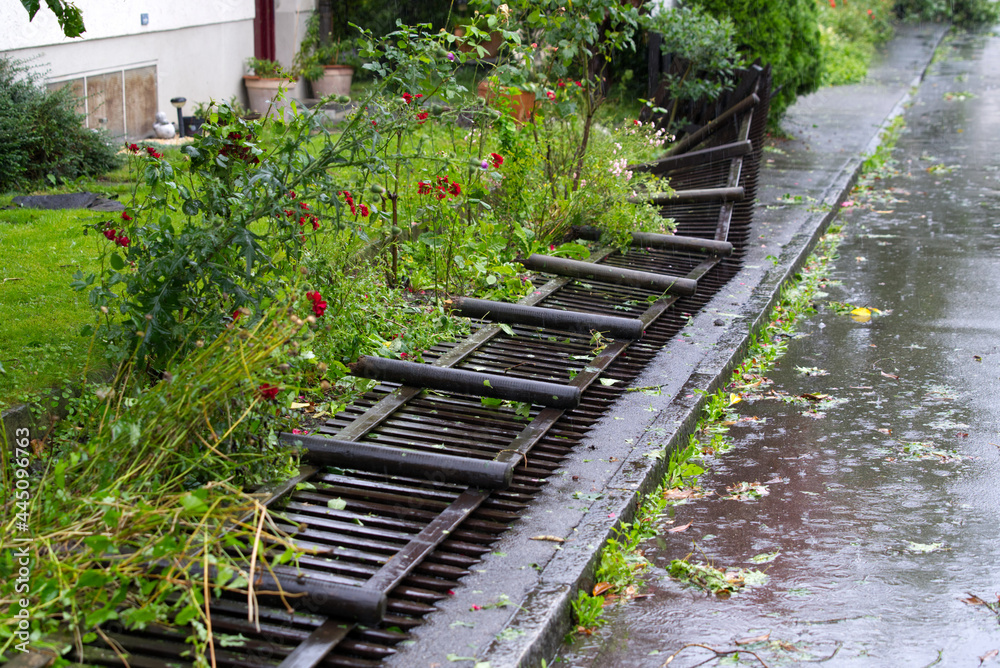 Broken wooden fence after nightly heavy summer thunderstorm at City of Zurich. Photo taken July 13th, 2021, Zurich, Switzerland. Broken wooden fence after nightly heavy summer thunderstorm at City of Zurich. Photo taken July 13th, 2021, Zurich, Switzerland.