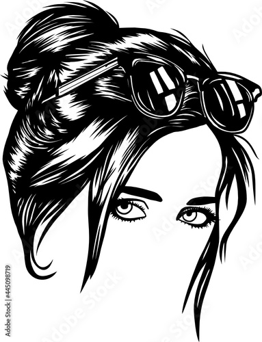 girl with messy bun and sunglasses