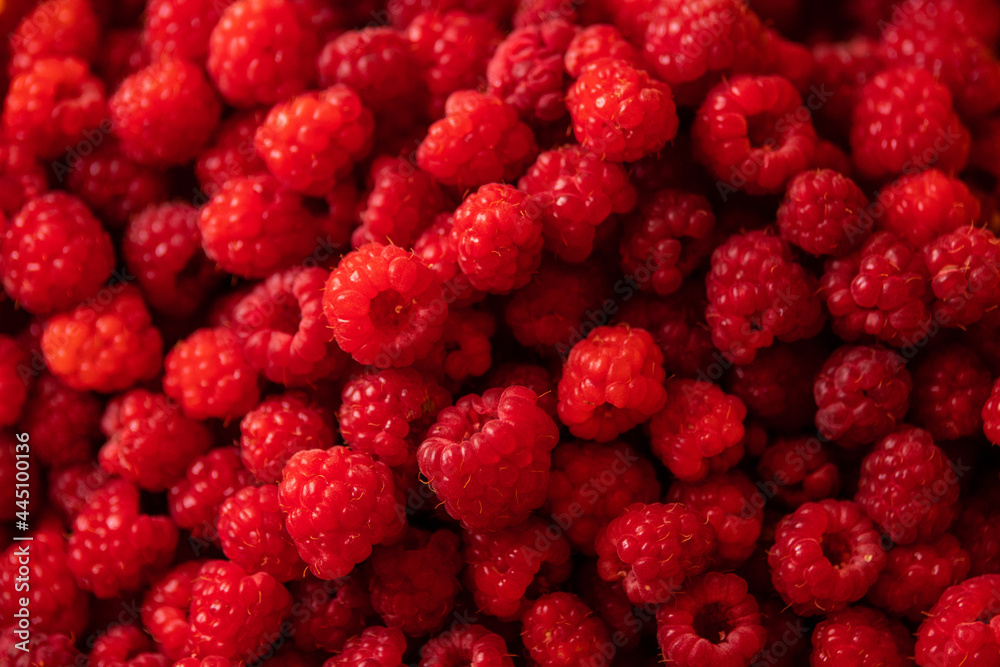 Ripe, juicy, tender and sweet raspberries as a background photo Ripe, juicy, tender and sweet raspberries as a background photo
