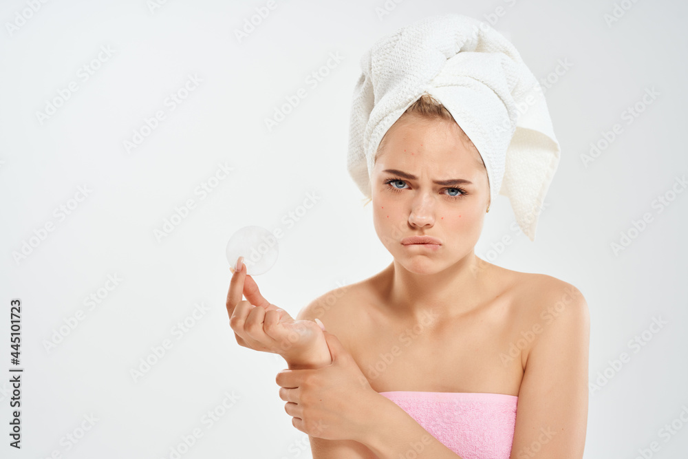 woman with bare shoulders cotton pad clear skin problems woman with bare shoulders cotton pad clear skin problems
