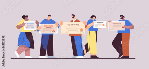 graduated businesspeople holding certificates graduates celebrating academic diploma degree corporate education