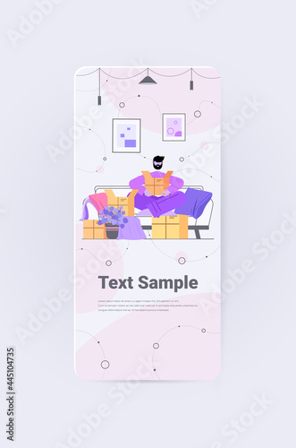 man opening cardboard parcel box unboxing mail delivery ordering online via internet concept