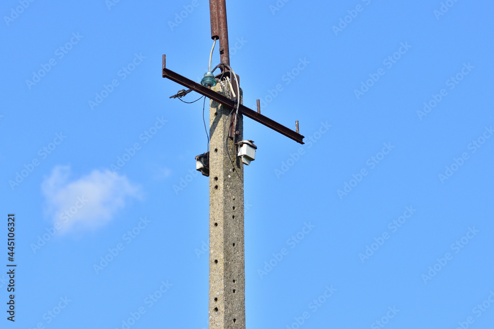 Broken electric wires on the pole and on the lamp. Summer. Day. Broken electric wires on the pole and on the lamp. Summer. Day.
