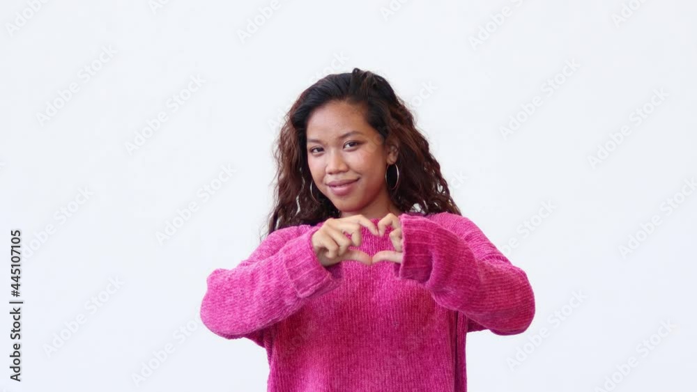 African woman showing heart sign. Healthy heart health life insurance, love, and charity, voluntary social work, organ donation concept, close-up portrait. African woman showing heart sign. Healthy heart health life insurance, love, and charity, voluntary social work, organ donation concept, close-up portrait.