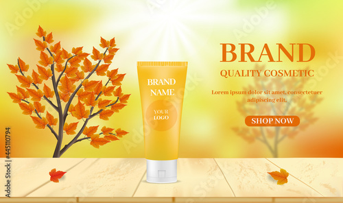 Skin care products on table on blurred background with twigs and leaf