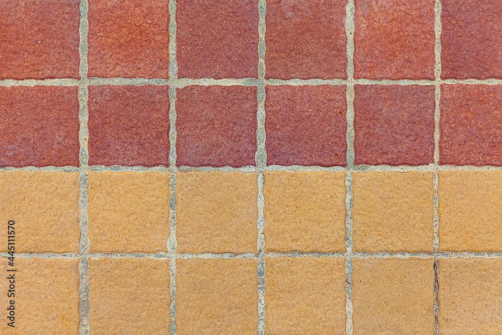 Fototapeta premium Brown terra cotta floor tiles outside the building pattern and background seamless