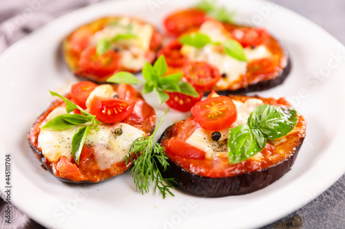aubergine pizza with tomato sauce,  mozzarella and basil