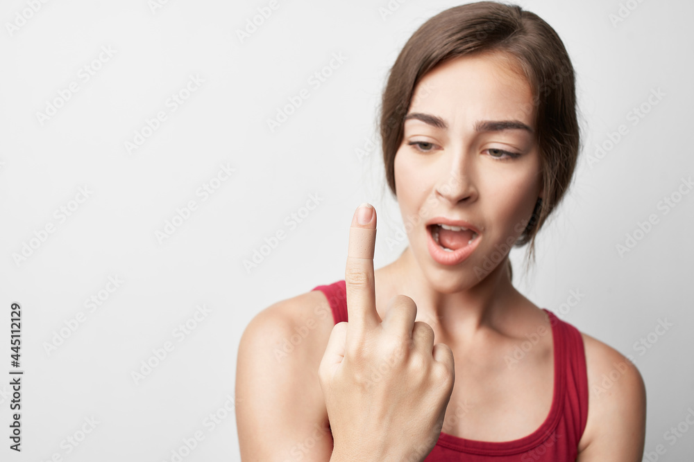 woman with injured forefinger pain medicine health problems woman with injured forefinger pain medicine health problems