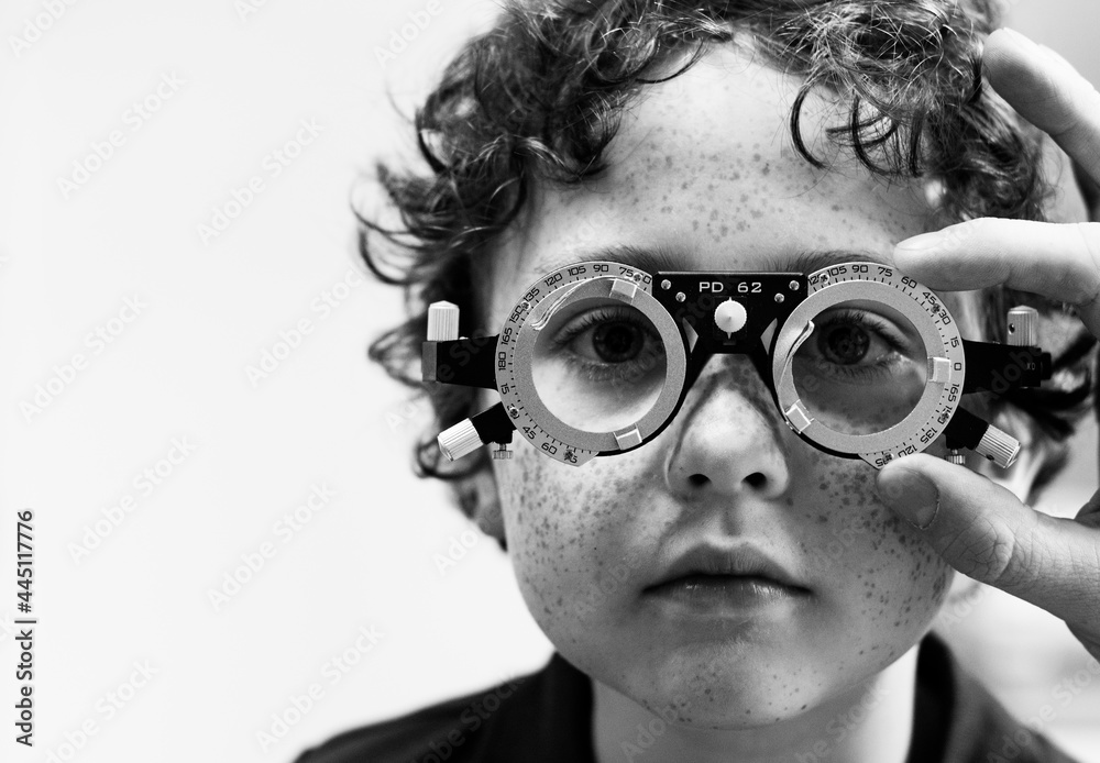 Young boy having his eyes checked Young boy having his eyes checked