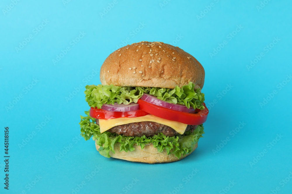Concept of tasty food with delicious burger Concept of tasty food with delicious burger