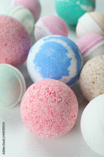 Different bath balls on white background, close up