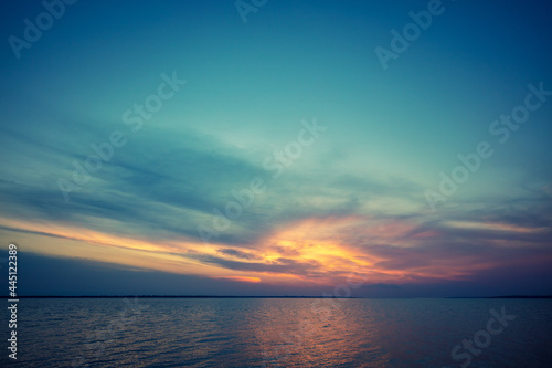Seascape in the early morning. Sunrise over the sea. Calm sea with beautiful sky. Nature landscape © vvvita