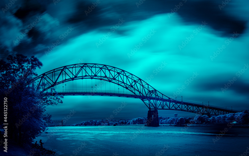 Obraz premium Dramatic Blue Night Cloudscape over Bourne Bridge on Cape Cod in Massachusetts