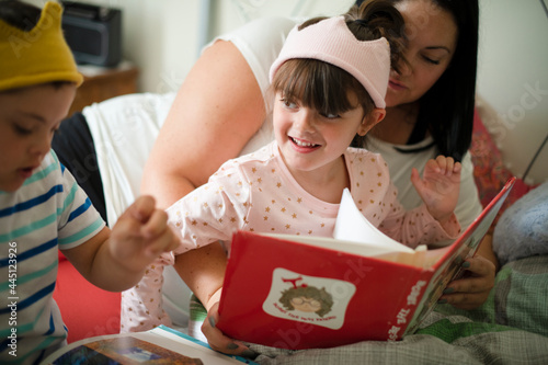 Mother reading a bedtime story photo