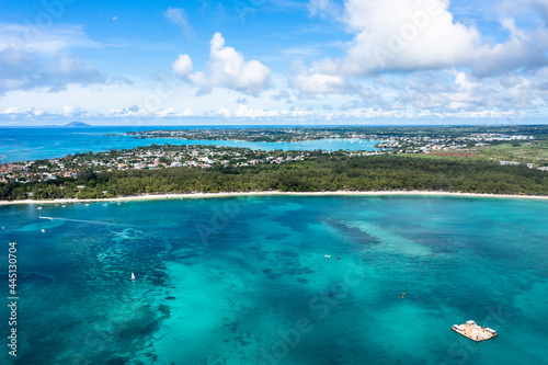 Fototapeta Naklejka Na Ścianę i Meble -  Aerial view, beaches with luxury hotels with water sports at Trou-aux-Biches Pamplemousses Region, behind Grand Baie, Mauritius, Africa