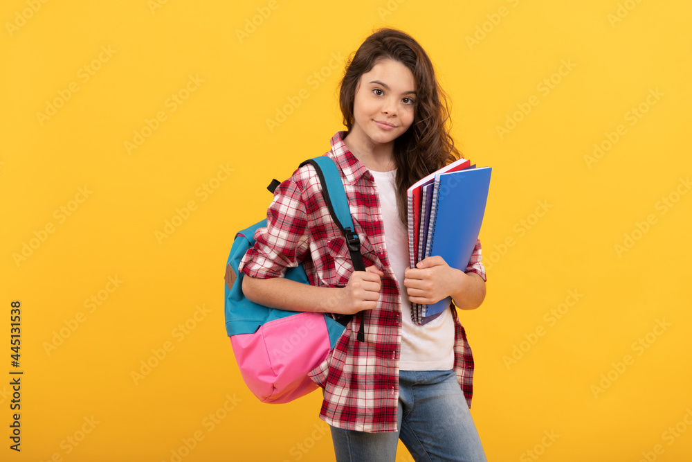smiling school teen girl ready to study with backpack and notebooks, education smiling school teen girl ready to study with backpack and notebooks, education
