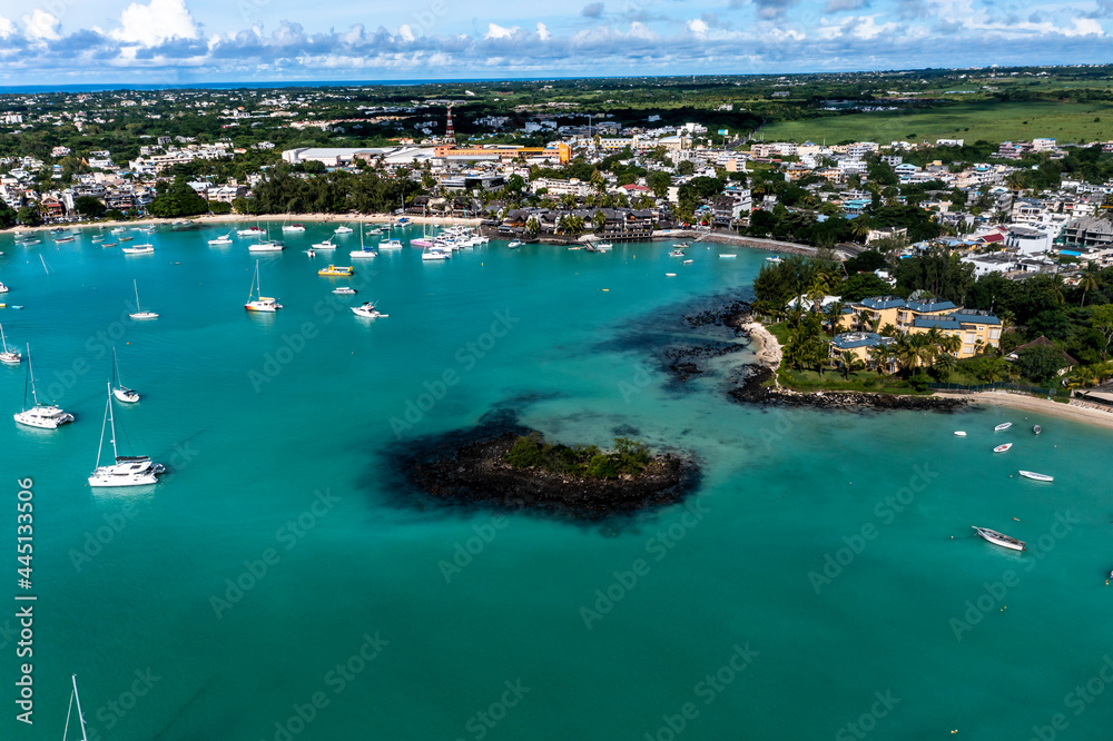 Aerial view, beaches with luxury hotels with water sports and boats at Trou-aux-Biches Pamplemousses Region, Mauritius, Africa