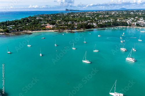 Aerial view, beaches with luxury hotels with water sports at Trou-aux-Biches Pamplemousses Region, behind Grand Baie, Mauritius, Africa