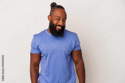 African american man with beard isolated on pink background confident keeping hands on hips.