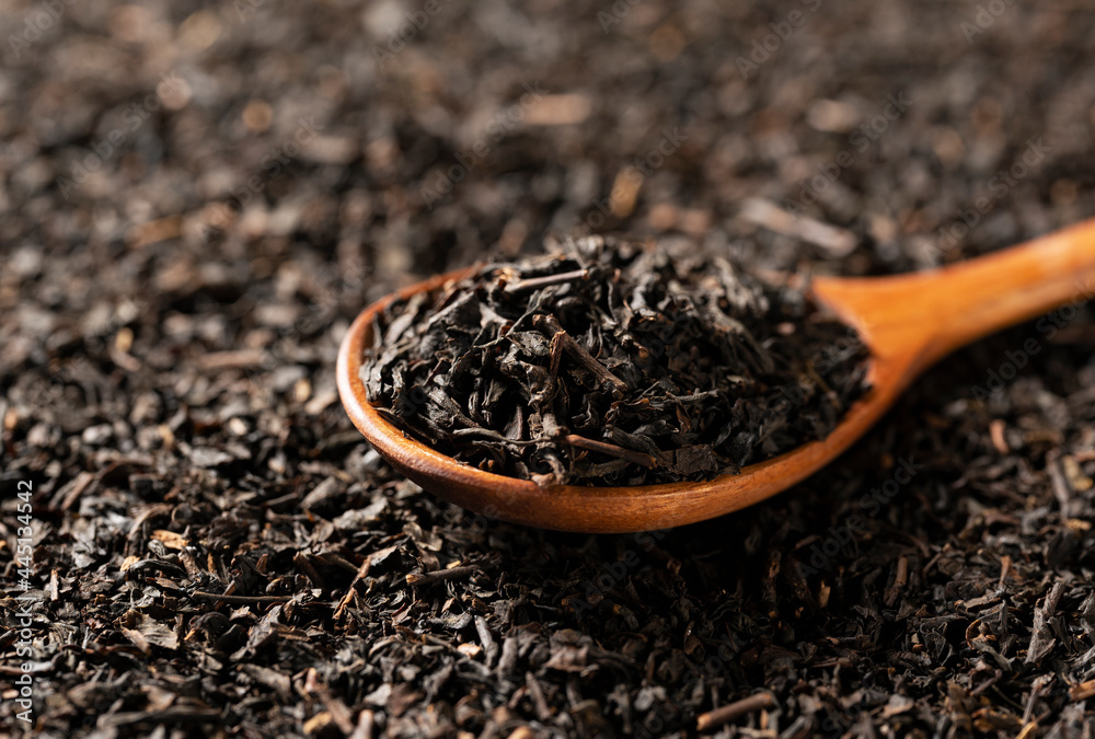 Ταπετσαρία Background with tea leaves and a wooden spoon for the entire screen