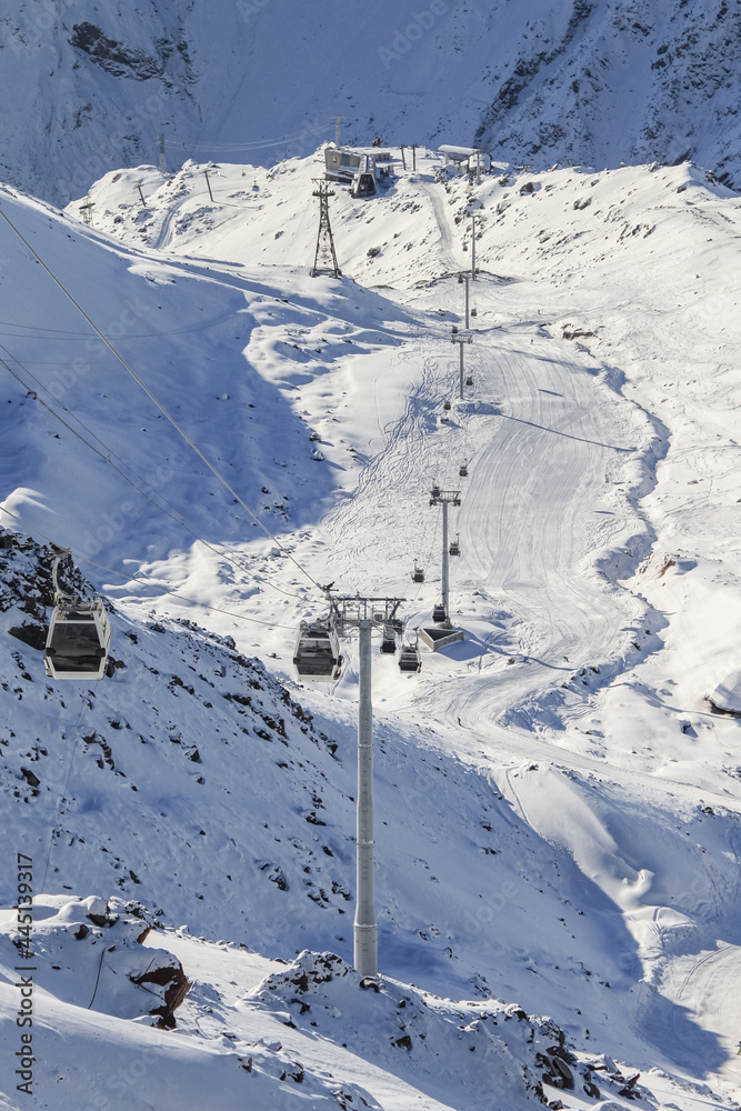 Cable car with cabins in a snow-covered ski resort