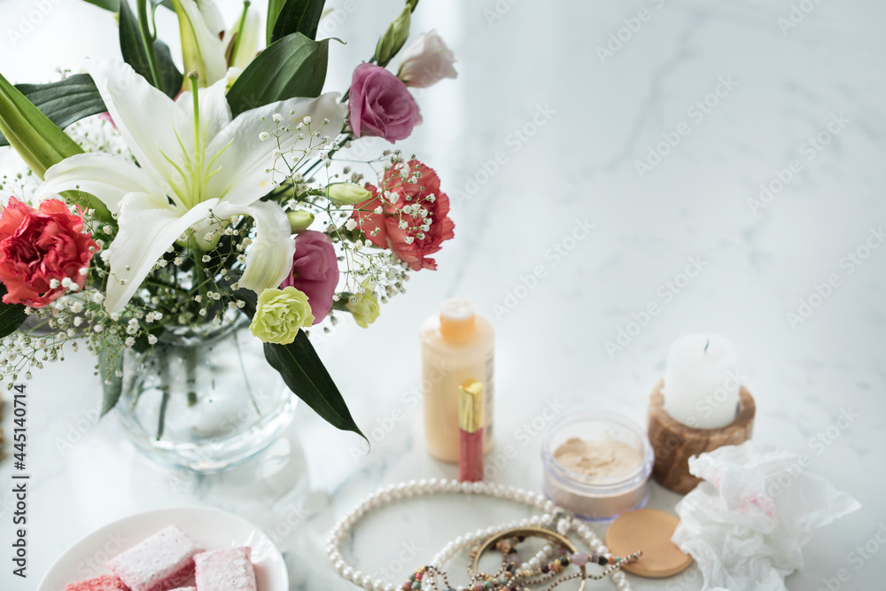 Woman cosmetics on marble table Woman cosmetics on marble table