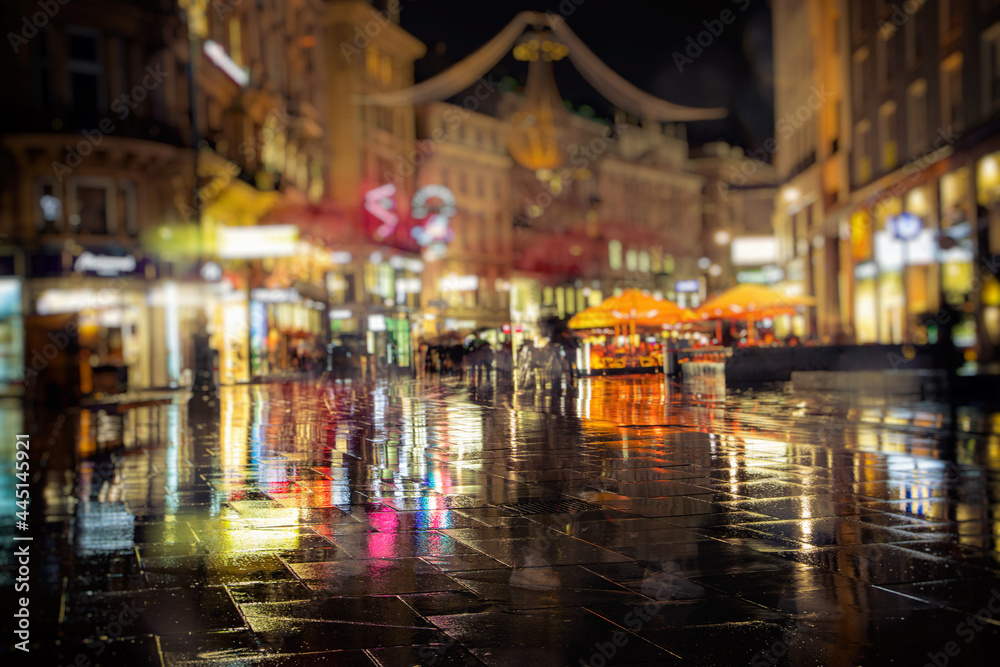 Naklejka premium city streets on rainy night 