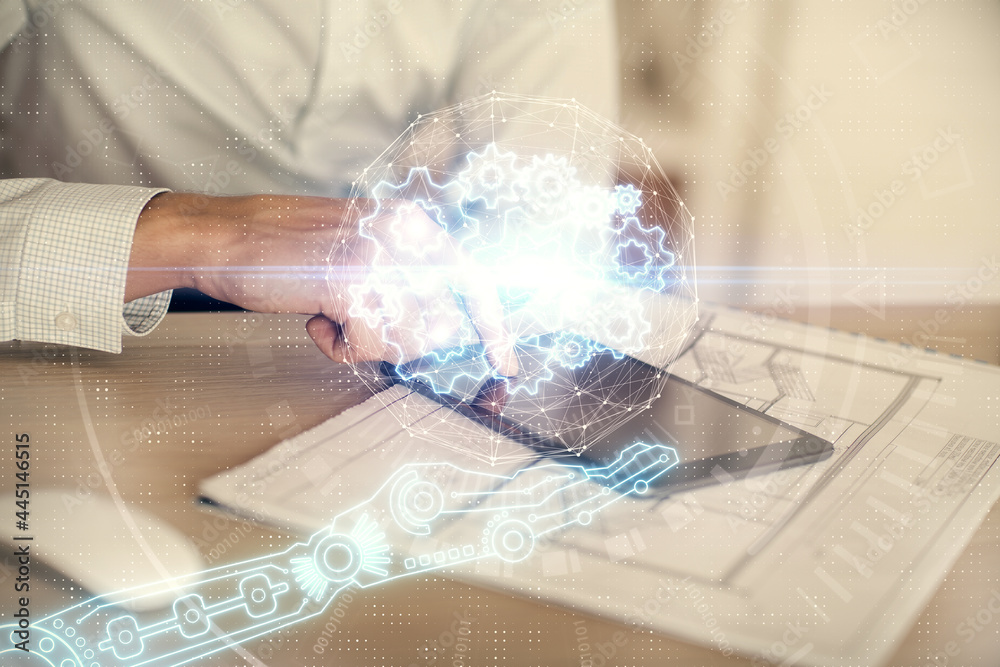 Double exposure of man's hand holding and using a digital device and data theme hologram drawing. Technology concept. Double exposure of man's hand holding and using a digital device and data theme hologram drawing. Technology concept.