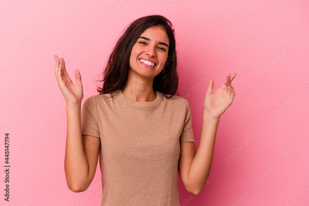 Young caucasian woman isolated on pink background joyful laughing a lot. Happiness concept.