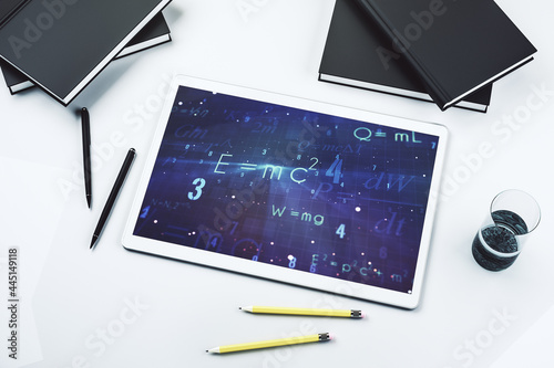 Creative scientific formula illustration on modern digital tablet display, science and research concept. Top view. 3D Rendering